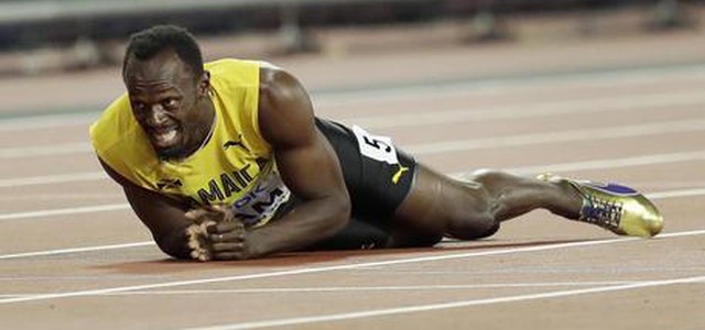 Bolt dramma ad ultima gara, i crampi lo fermano